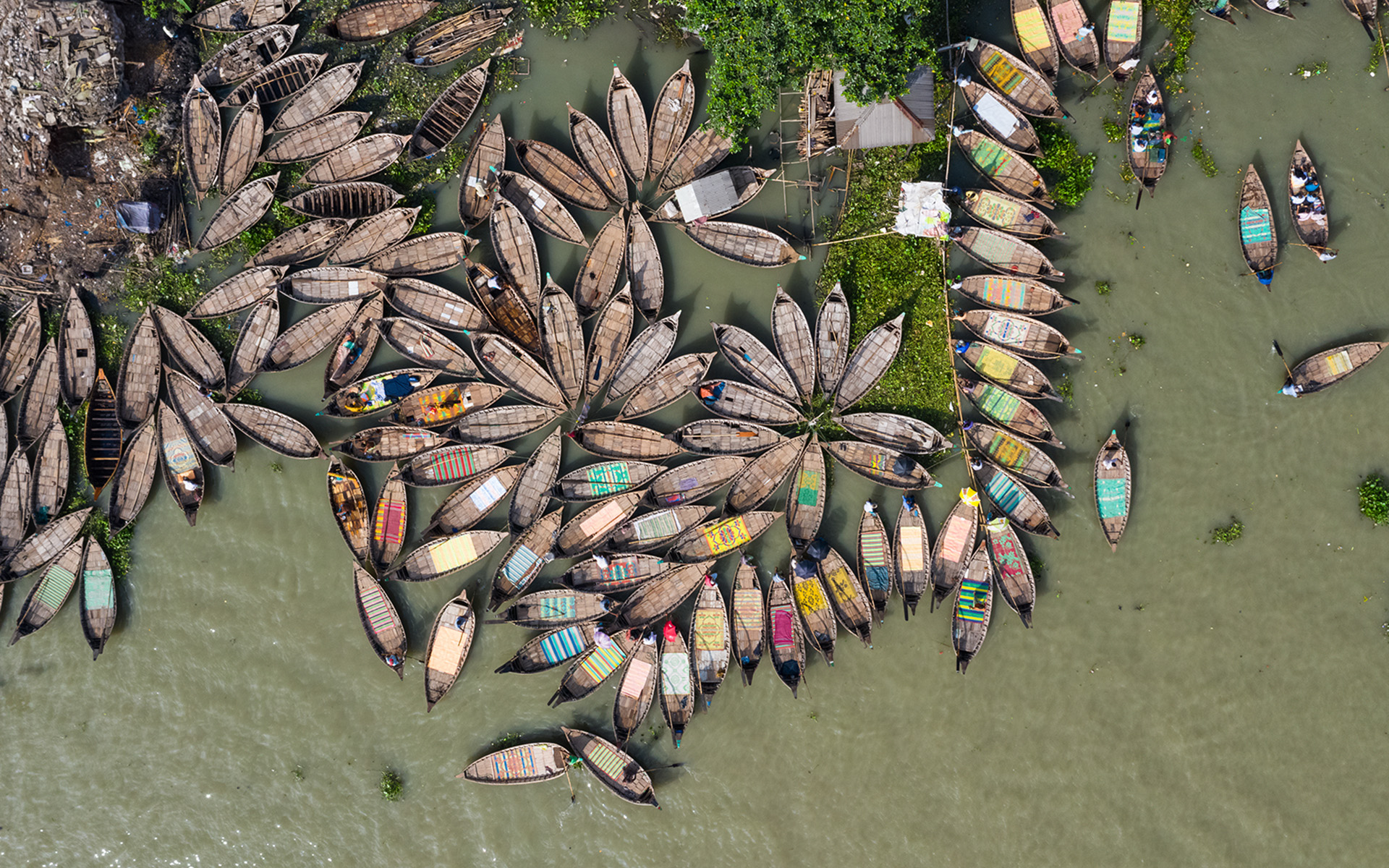 A bird's eye view of boats on the Dhaka coastline.