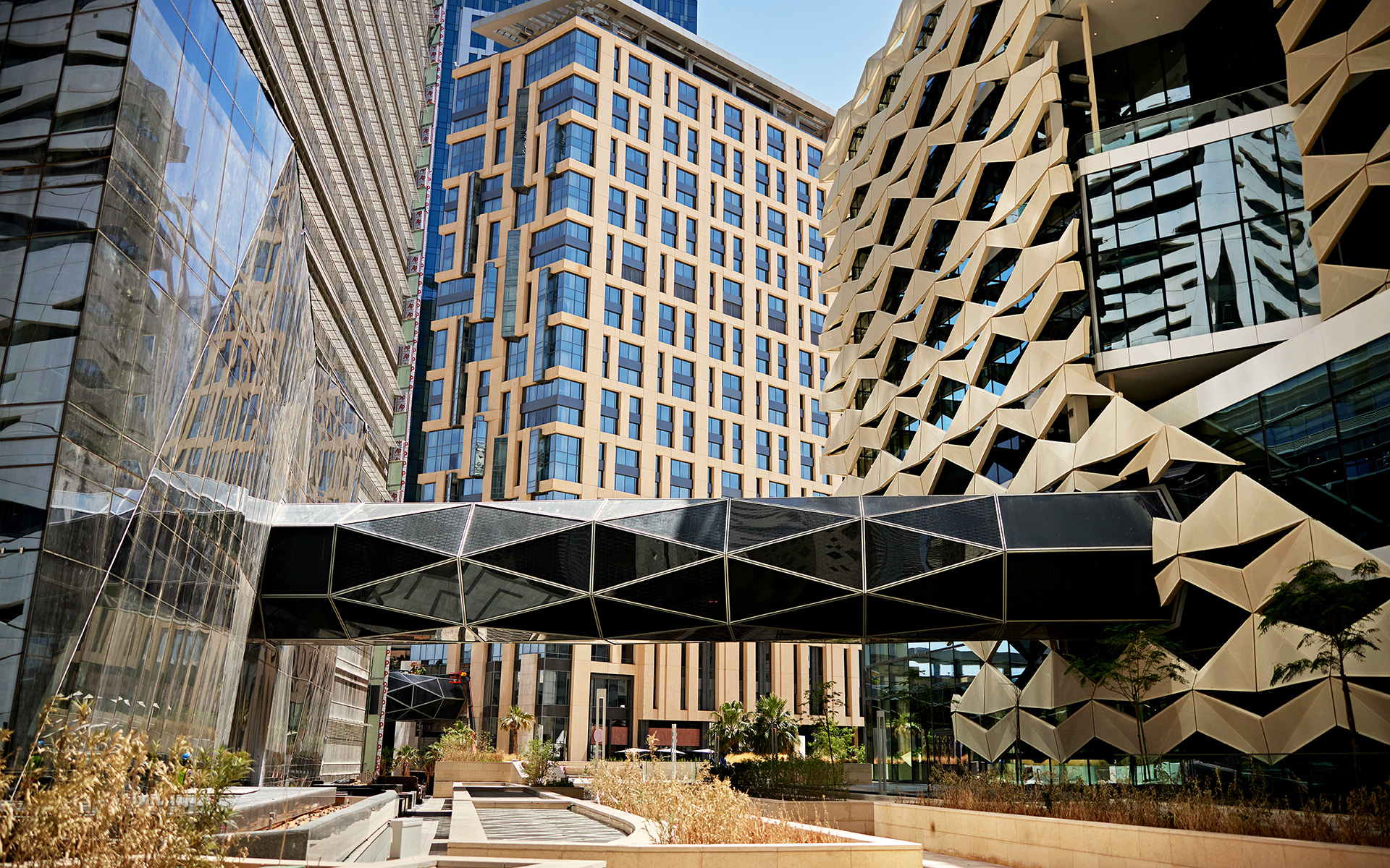 A walking tunnel and buildings in Riyadh's downtown.