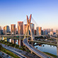 São Paulo's Octavio Frias de Oliveira bridge and city skyline.